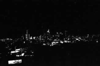 Image of the Dallas skyline on the night of November 22, 1963