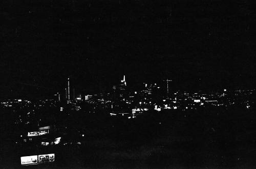 Image of the Dallas skyline on the night of November 22, 1963