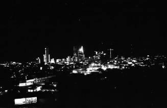 Image of the Dallas skyline on the night of November 22, 1963