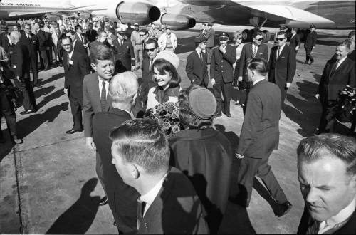 Image of the Kennedys greeting local dignitaries at Love Field