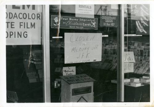 Black and white photograph of an Oak Cliff business closed after the shooting