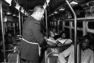 Image of the interior of a Dallas bus on the evening of November 22, 1963