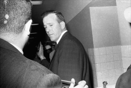 Image of unidentified man in the hallway at Dallas Police Headquarters