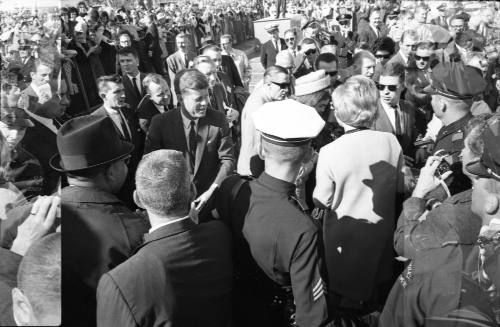 Image of the Kennedys greeting the crowd at Love Field