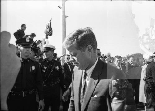 Images of President Kennedy greeting the crowd at Love Field