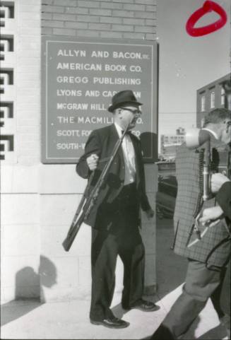 Image from contact sheet of Lieutenant J.C. "Carl" Day with rifle