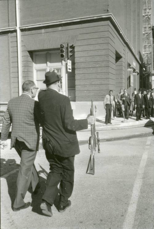 Image from contact sheet of Lieutenant J.C. "Carl" Day with rifle