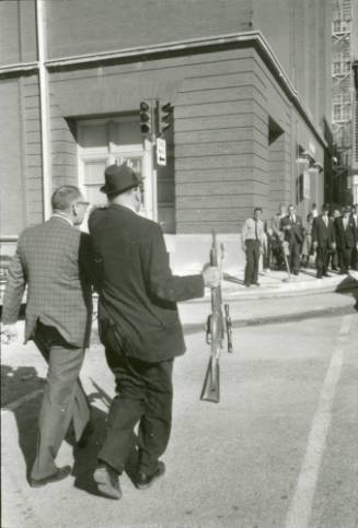 Image from contact sheet of Lieutenant J.C. "Carl" Day with rifle