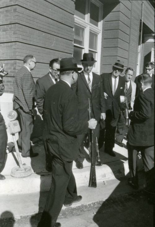 Image from contact sheet of Lieutenant J.C. "Carl" Day with rifle