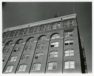 Photograph of the Texas School Book Depository shortly after shots were fired