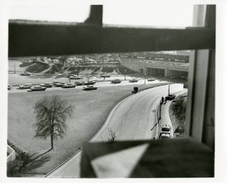 Photo of the view of Dealey Plaza from the sniper's perch window