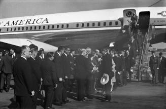 Image of Govenor Connally and Jackie Kennedy greeting dignitaries at Love Field