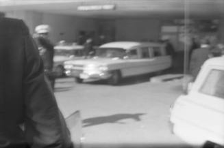 Image of a hearse arriving at Parkland Hospital