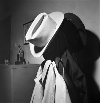 Image of Governor Connally's blood-spattered hat hanging in Jesse Curry's office