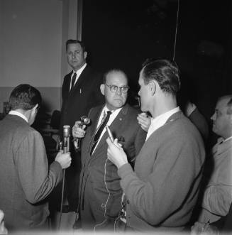 Image of Dallas Police Chief Jesse Curry talking to reporters