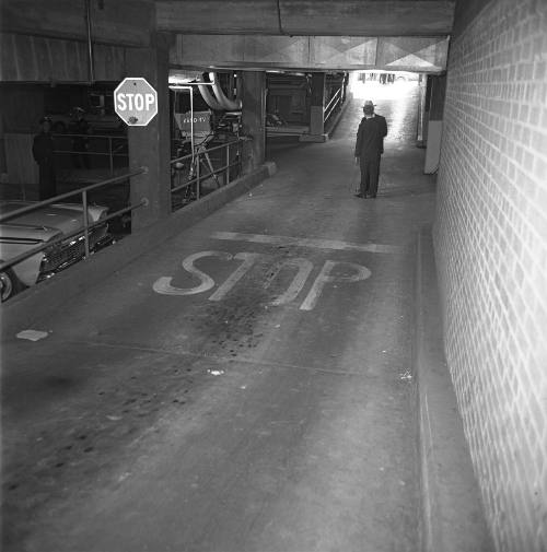 Image of Bob Huffaker interviewing Lt. Richard E. Swain where Oswald was shot