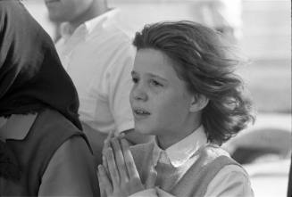 Image of schoolgirl Kathey Atkinson reacting to news of the president's death