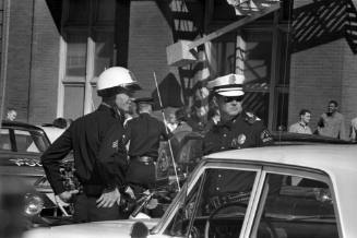 Image of Dallas Police officers in intersection of Houston and Elm streets