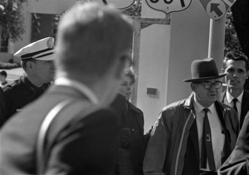 Image of Dallas Police officers and a deputy sheriff in Dealey Plaza