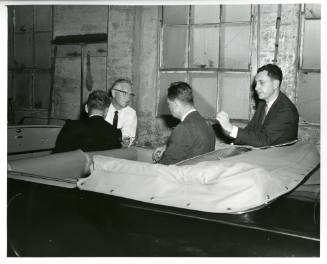 Black and white photograph of FBI reenactment of assassination
