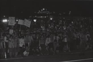 Image of crowd awaiting the Kennedys at Carswell Air Force Base in Fort Worth