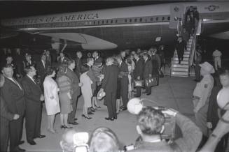 Image of official party disembarking Air Force One at Carswell Air Force Base
