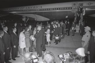 Image of presidential party greeting dignitaries at Carswell Air Force Base