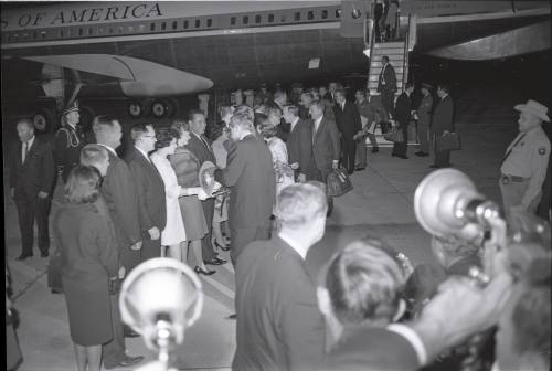 Image of presidential party greeting dignitaries at Carswell Air Force Base