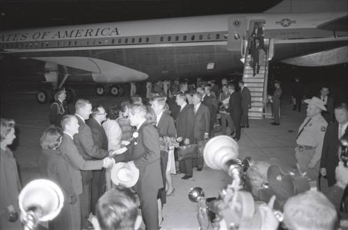 Image of presidential party greeting dignitaries at Carswell Air Force Base