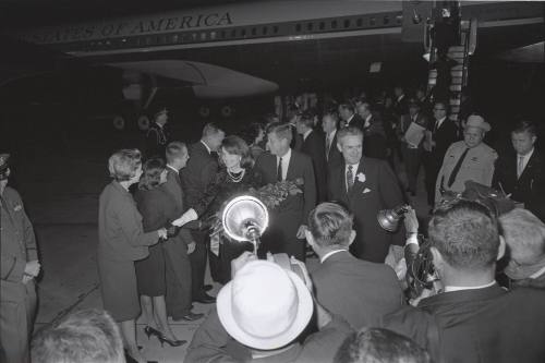 Image of presidential party greeting dignitaries at Carswell Air Force Base