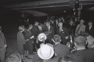 Image of presidential party greeting dignitaries at Carswell Air Force Base