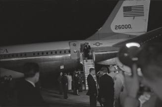 Image of the Kennedys disembarking Air Force One at Carswell AFB