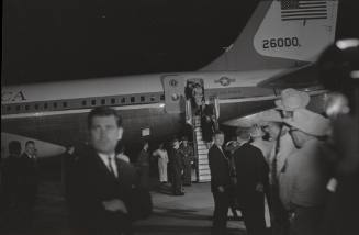 Image of the Kennedys disembarking Air Force One at Carswell AFB