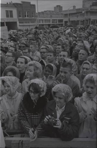 Image of the crowd listening to President Kennedy speak outside the Hotel Texas