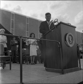 Image of President Kennedy speaking at Brooks Air Force Base