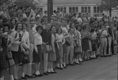 Image of spectators along motorcade route in San Antonio, Texas