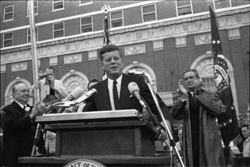 Image of President Kennedy speaking in the Hotel Texas parking lot