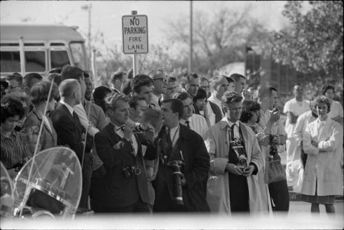 Image of photographers and crowd outside of Parkland Hospital