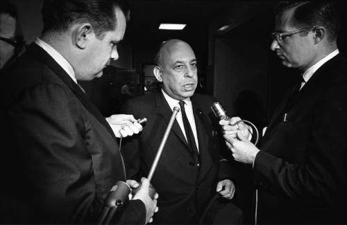 Reporters interview Stanley Marcus during Jack Ruby's change-of-venue hearing