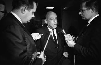 Reporters interview Stanley Marcus during Jack Ruby's change-of-venue hearing