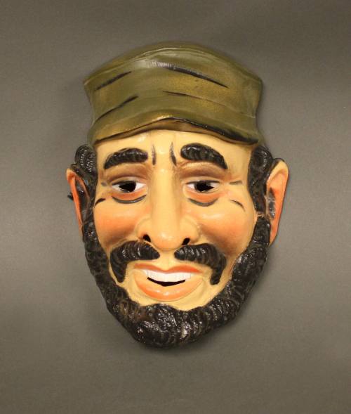 Plastic Halloween mask in the shape of a caricature of Fidel Castro