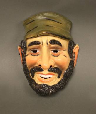 Plastic Halloween mask in the shape of a caricature of Fidel Castro