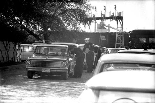 Image of Dallas Police officers stopping cars on the Elm Street extension