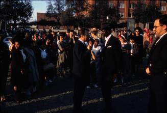 Image of news reporter interviewing an unknown man in Dealey Plaza