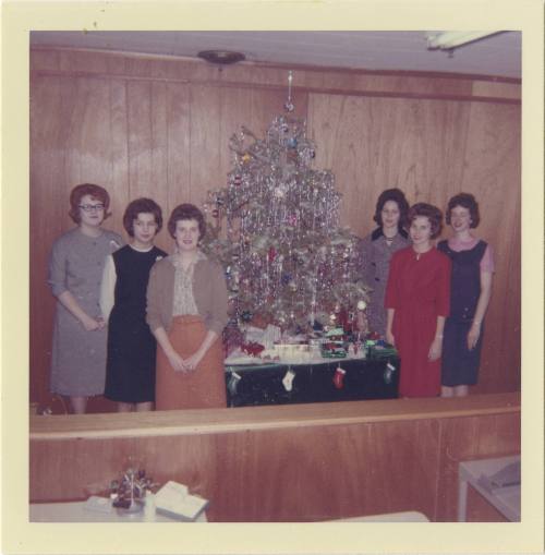 Color photograph of six women who worked in the Texas School Book Depository