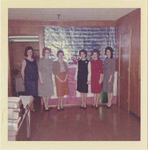 Color photograph of six women who worked in the Texas School Book Depository