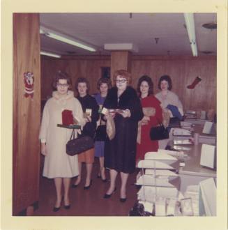 Color photograph of six women who worked in the Texas School Book Depository