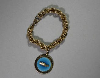 Charm bracelet from the 1960 campaign featuring a PT-109 boat