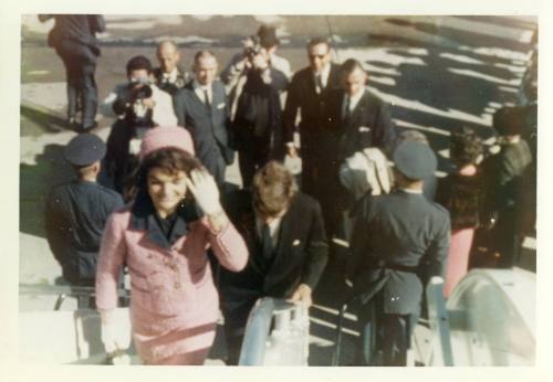 Color photograph of the Kennedys boarding Air Force One in Fort Worth