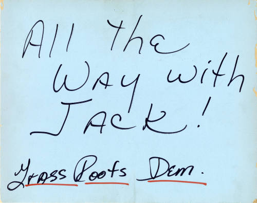 Handmade cardboard "All the Way with Jack!" sign welcoming JFK to Love Field